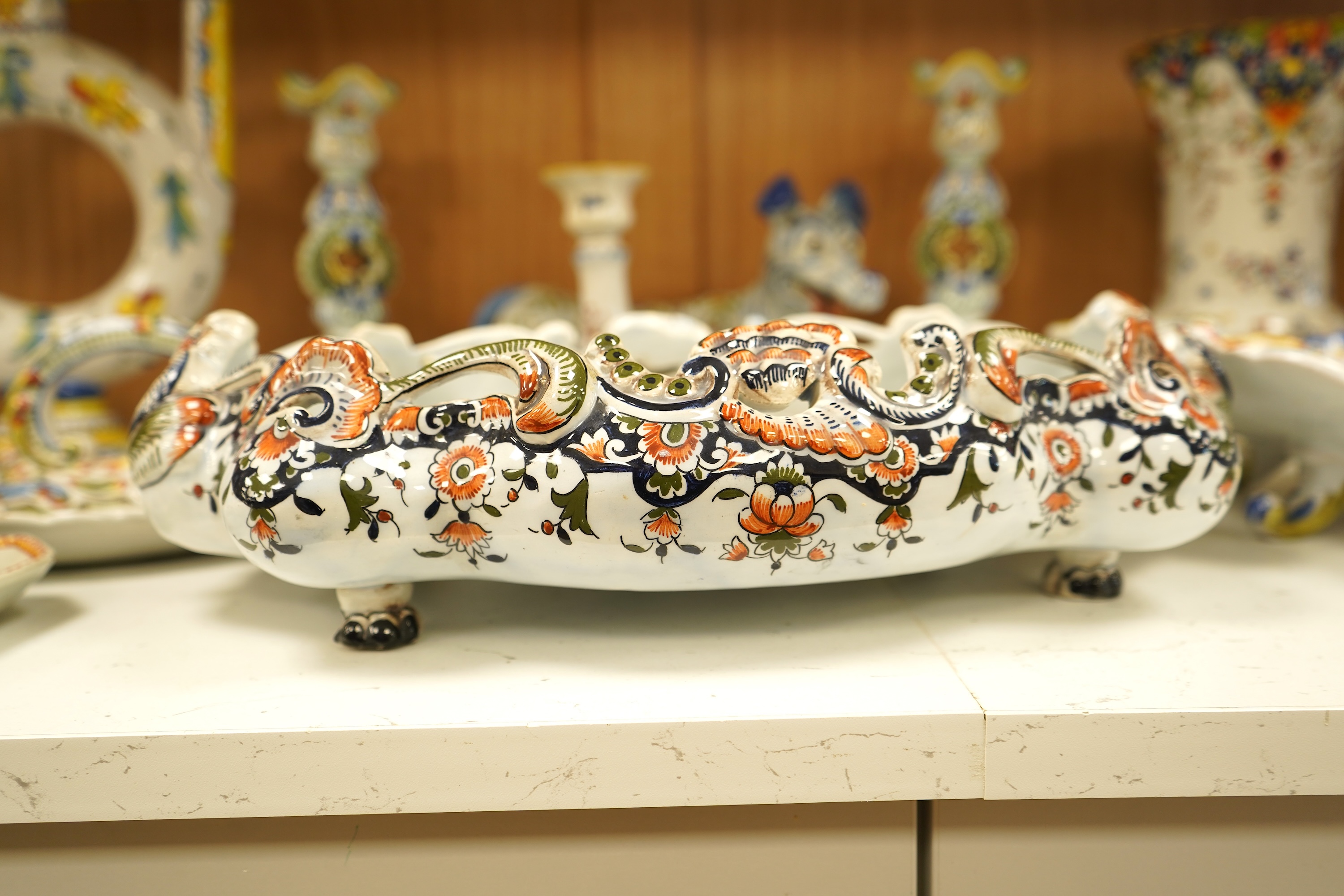 A collection of early 20th century French faience pieces To include dishes, an inkwell and a large ewer, 42cm high